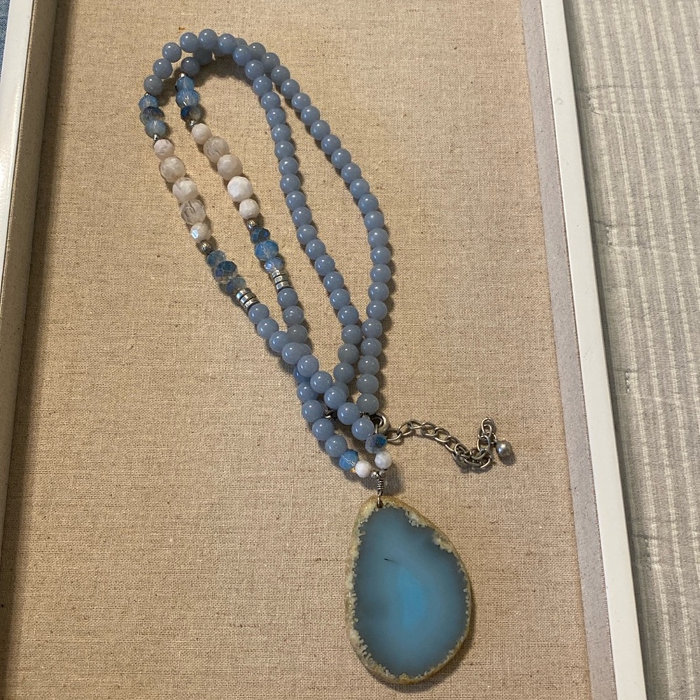 Wow! 32” beautiful Chico’s necklace with stone powder blue pendant.
